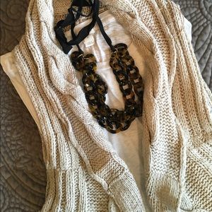 Sleeveless cable sweater